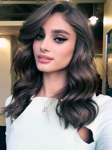 Elegant Hairstyle On Woman Front Swooping Curls And Old Hollywood Waves