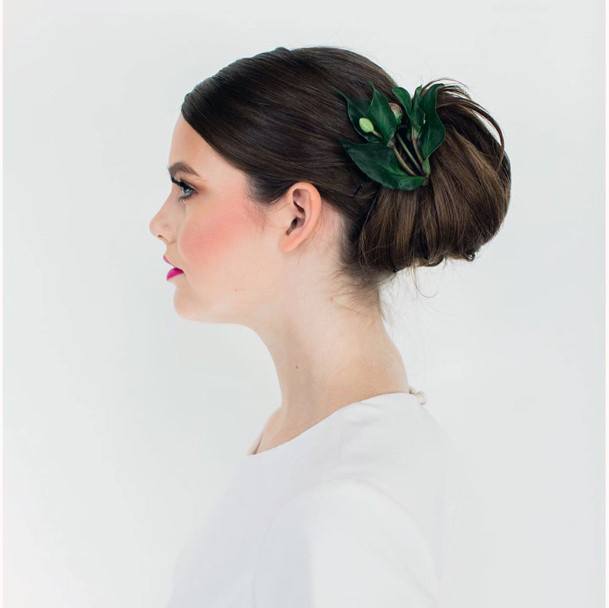 Elegant Updo In Chocolate Brown Hair And Natural Element Hair Accessory