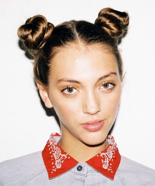 Elegant White Woman With Straight Brown Double Top Knot Hair