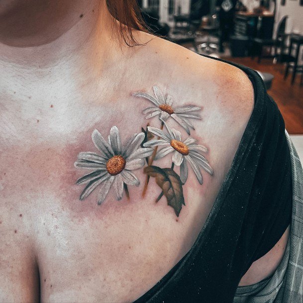 Enchanting Daisy Tattoo Ideas For Women