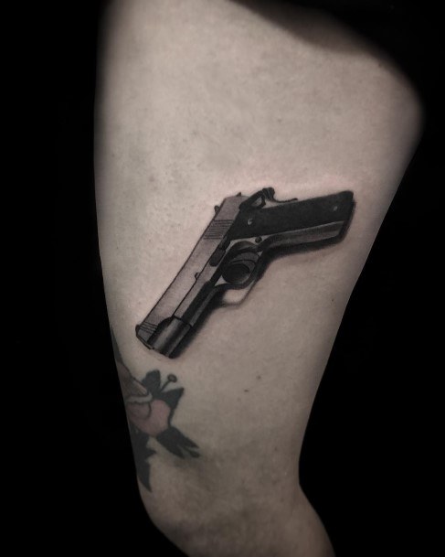 Enchanting Gun Tattoo Ideas For Women