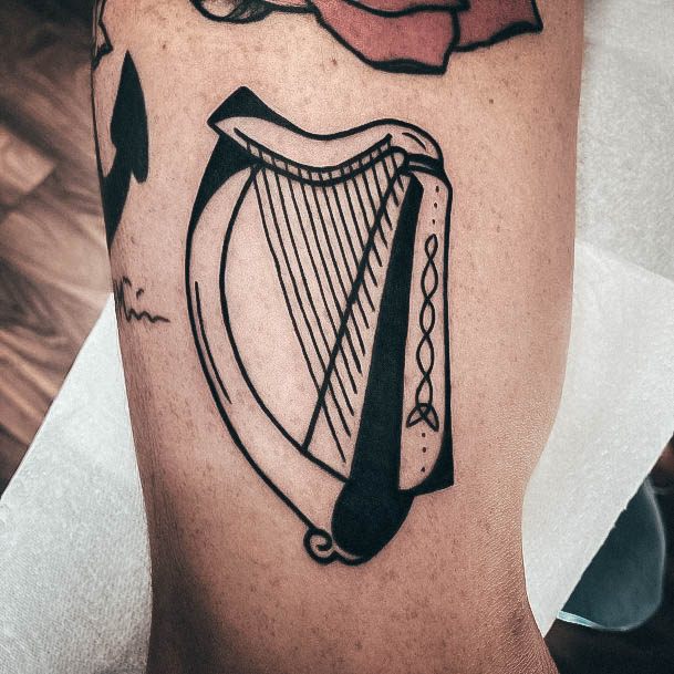 Enchanting Harp Tattoo Ideas For Women