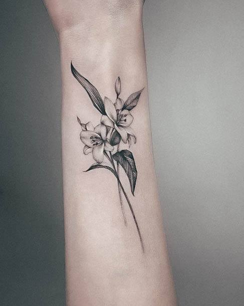 Enchanting Lily Tattoo Ideas For Women Wrist