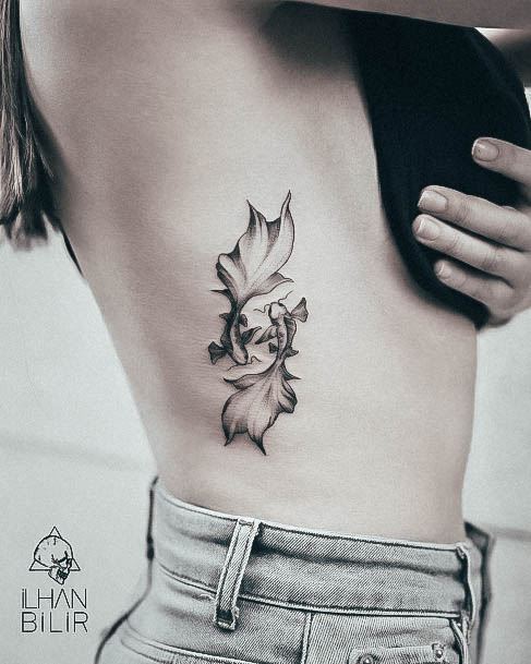 Enchanting Pisces Tattoo Ideas For Women Ribs