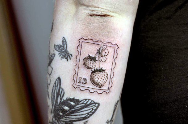 Enchanting Postage Stamp Tattoo Ideas For Women