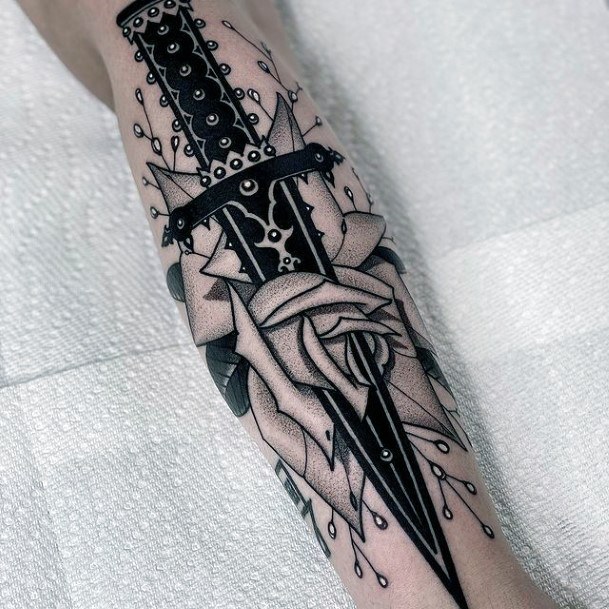 Enchanting Sword Tattoo Ideas For Women