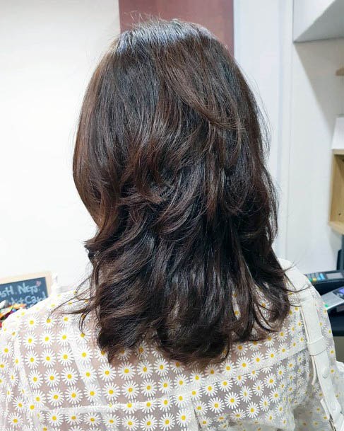 Espresso Brown Hair Pulled Back With Volume Waves Throughout