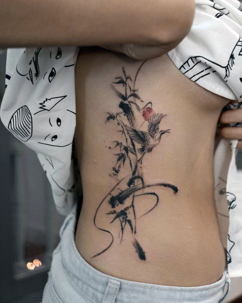 Exquisite Bamboo Tattoos On Girl