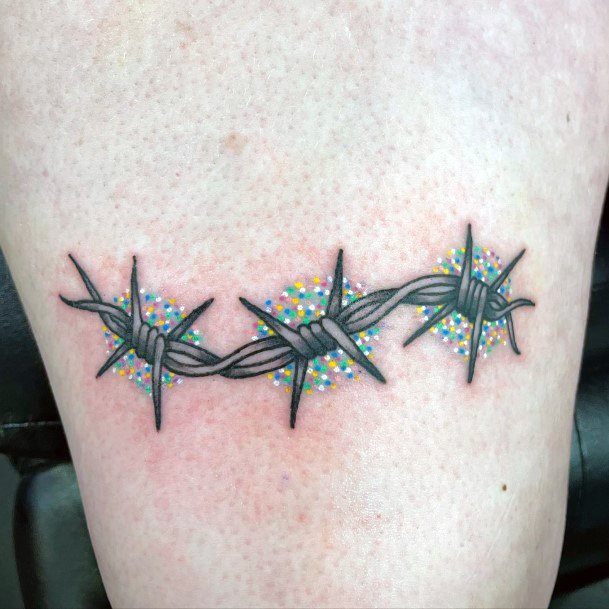 Exquisite Barbed Wire Tattoos On Girl