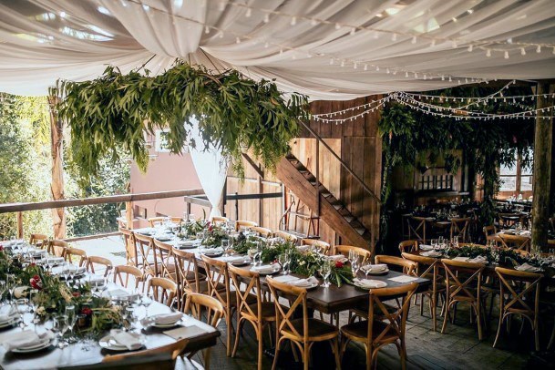 Exquisite Barn Wedding Ideas Bright String Lights Hanging Greenery Decoration