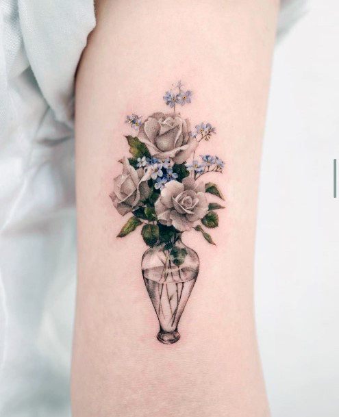 Exquisite Bouquet Tattoos On Girl