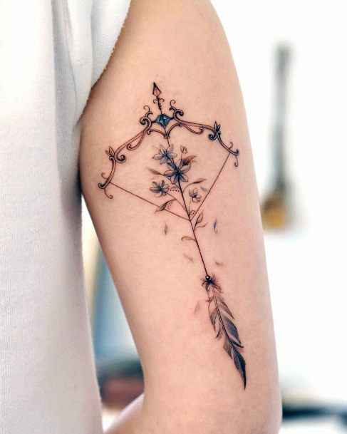 Exquisite Bow And Arrow Tattoos On Girl