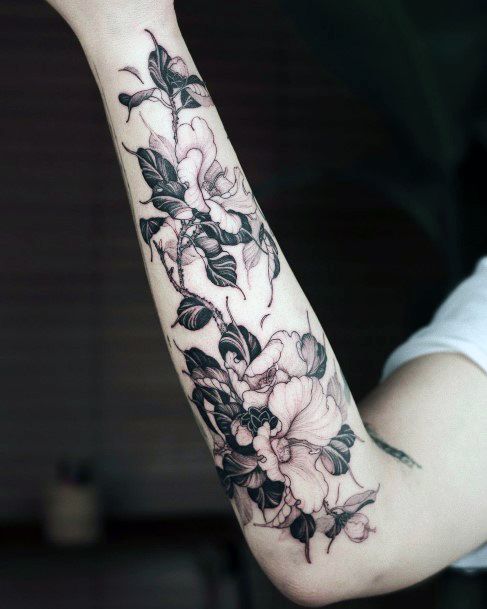 Exquisite Camellia Tattoos On Girl