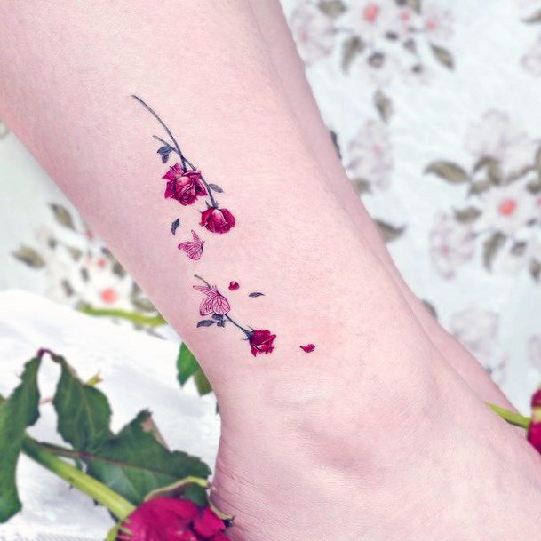 Exquisite Flower Petal Tattoos On Girl