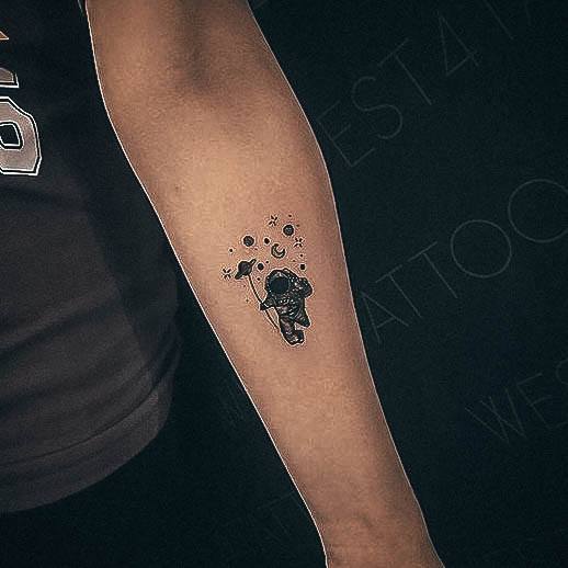 Exquisite Galaxy Tattoos On Girl Astronaut Small Forearm