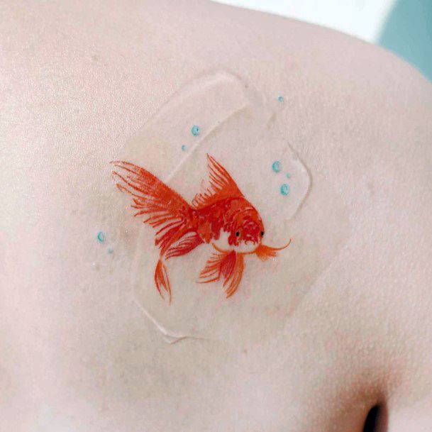 Exquisite Goldfish Tattoos On Girl