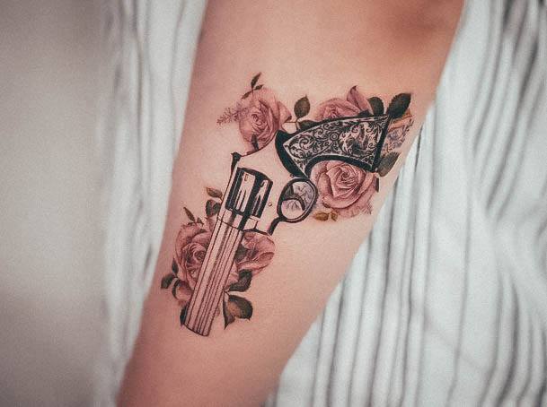 Exquisite Gun Tattoos On Girl