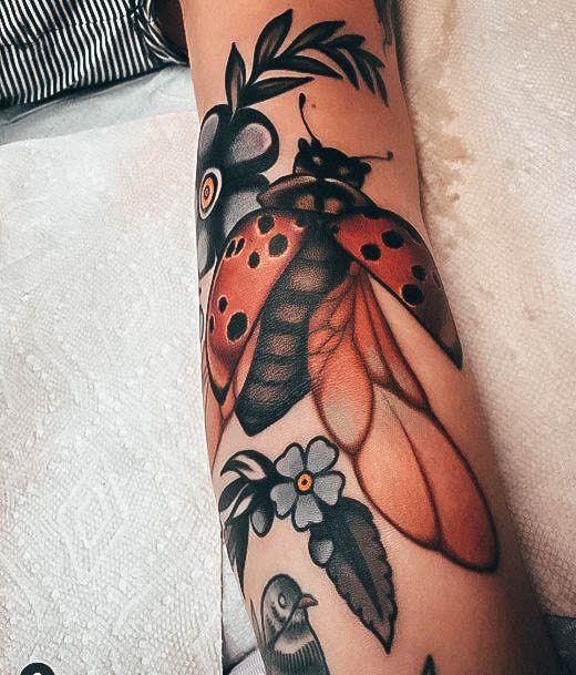 Exquisite Ladybug Tattoos On Girl