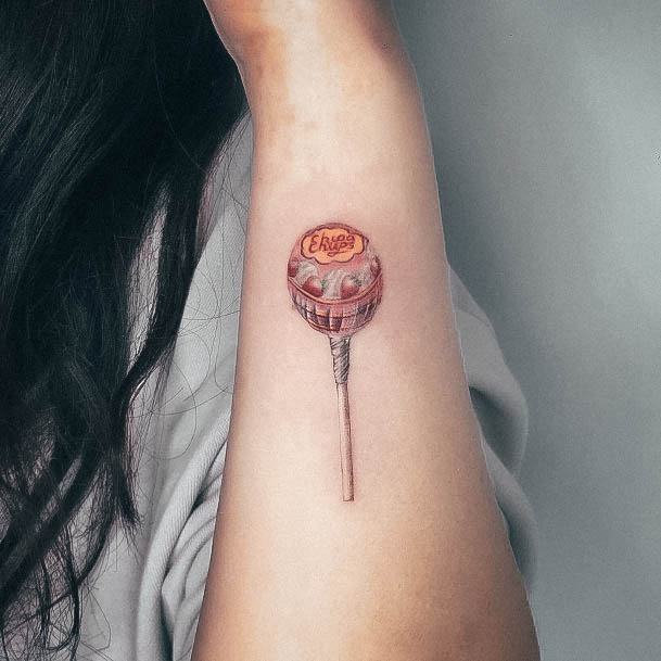 Exquisite Lollipop Tattoos On Girl