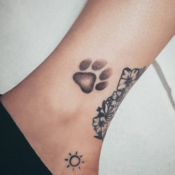 Exquisite Paw Print Tattoos On Girl