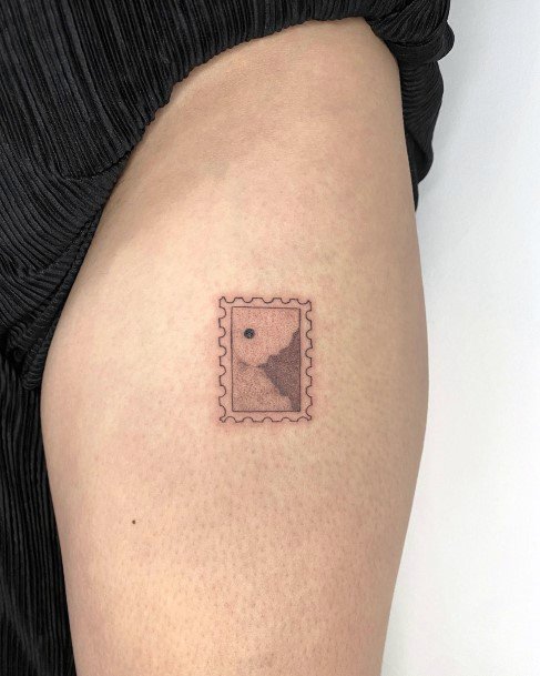 Exquisite Postage Stamp Tattoos On Girl