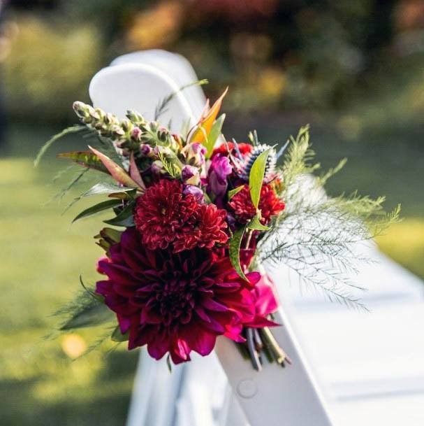 Exquisite Red Flowers On White Chairs