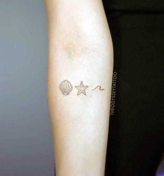 Exquisite Starfish Tattoos On Girl