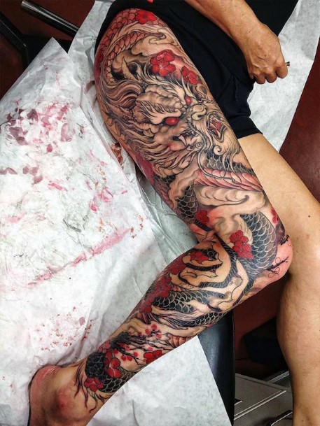 Extreme Dragon Tattoo With Red Womens Legs