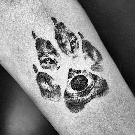 Eyes Of Wolf On Its Claws Tattoo Womens Hand