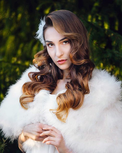 Face Framing Curls And Old Hollywood Waves Hairstyle On Young Woman