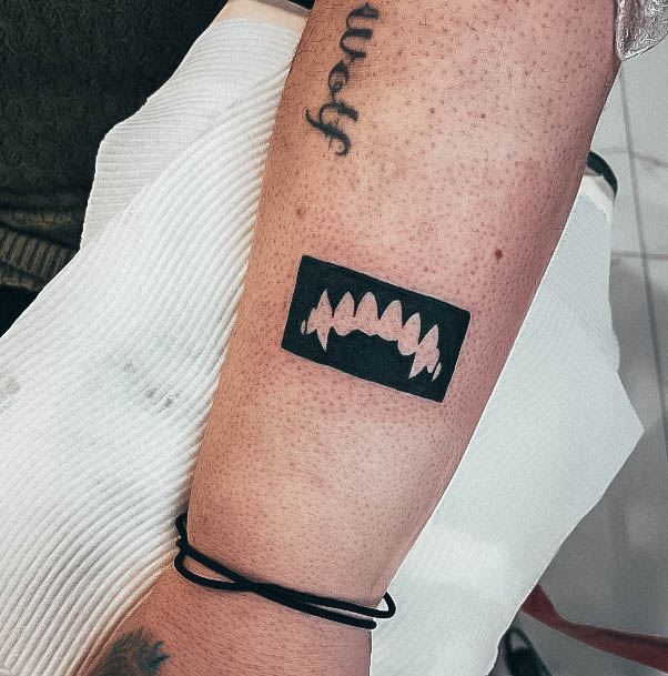 Fantastic Fangs Tattoo For Women