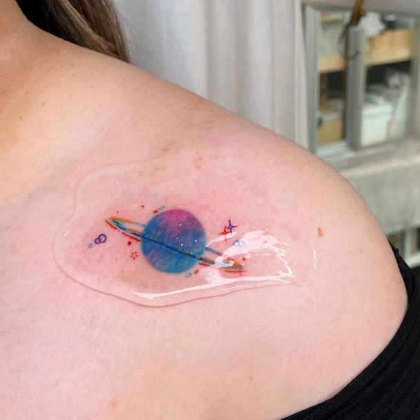 Fantastic Saturn Tattoo For Women