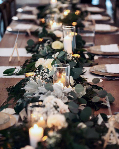 Fascinating Winter Greenery Lush White Floral Wedding Reception Decoration Ideas