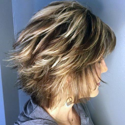 Feathery Long Bob Hairstyles For 50 Year Old Woman With Thick Hair