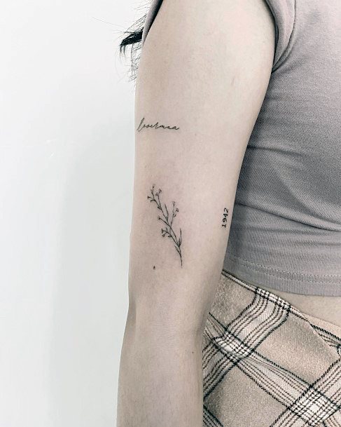 Female Babys Breath Tattoo On Woman