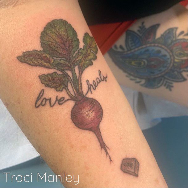 Female Beet Tattoo On Woman