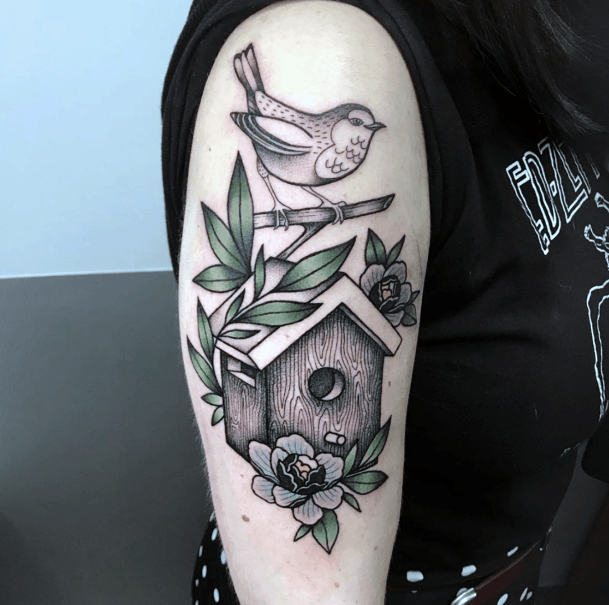 Female Birdhouse Tattoo On Woman