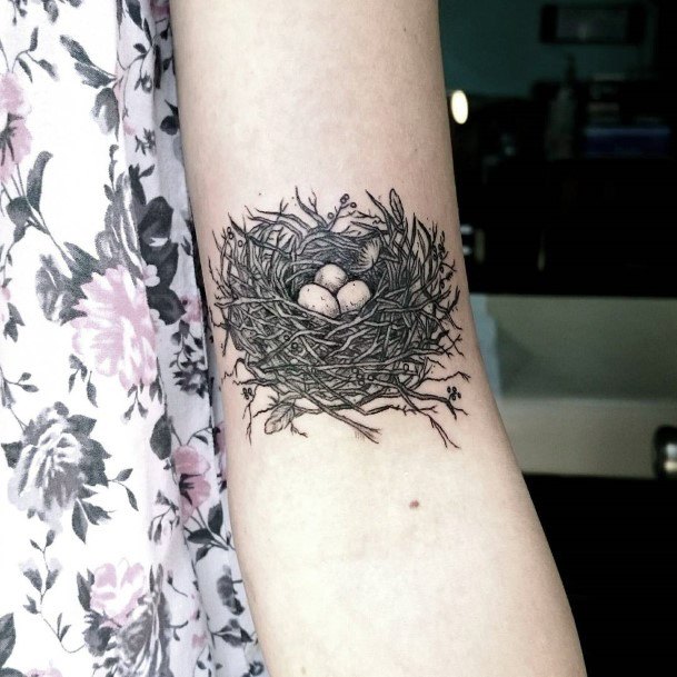 Female Birds Nest Tattoo On Woman