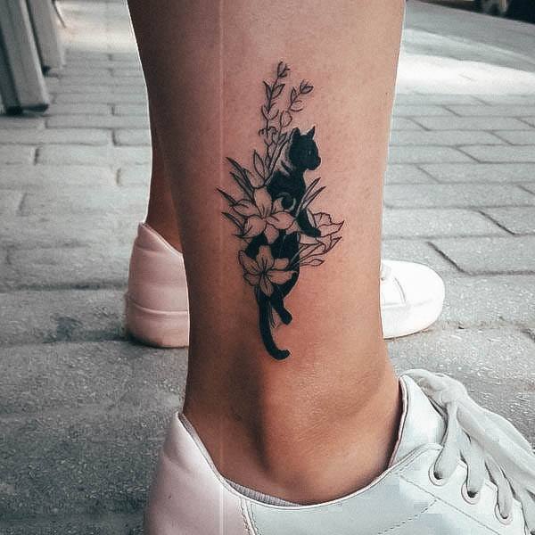 Female Black Cat Tattoo On Woman