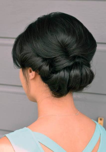 Female Black Hair And Low Twist Bun