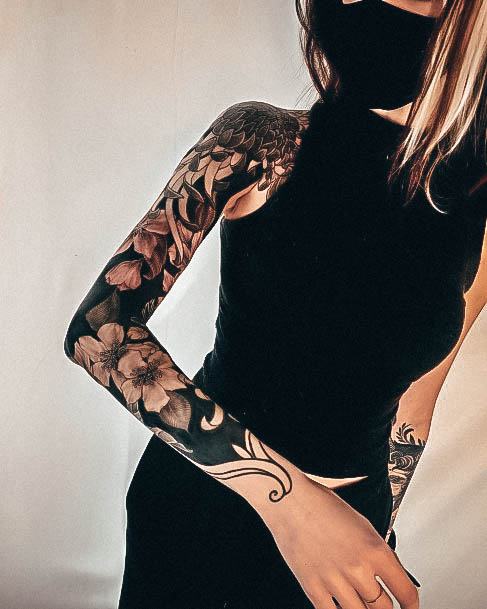 Female Blackout Tattoo On Woman