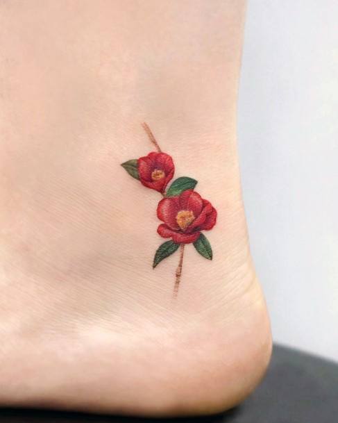 Female Camellia Tattoo On Woman