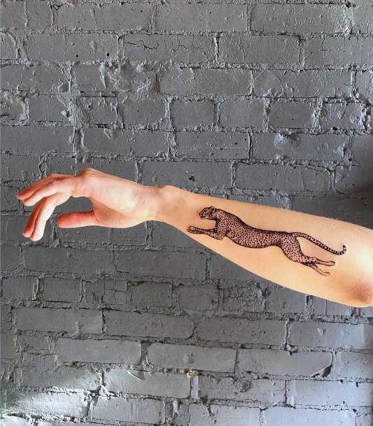 Female Cheetah Tattoo On Woman