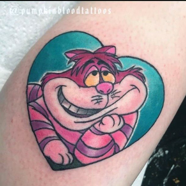 Female Cheshire Cat Tattoo On Woman