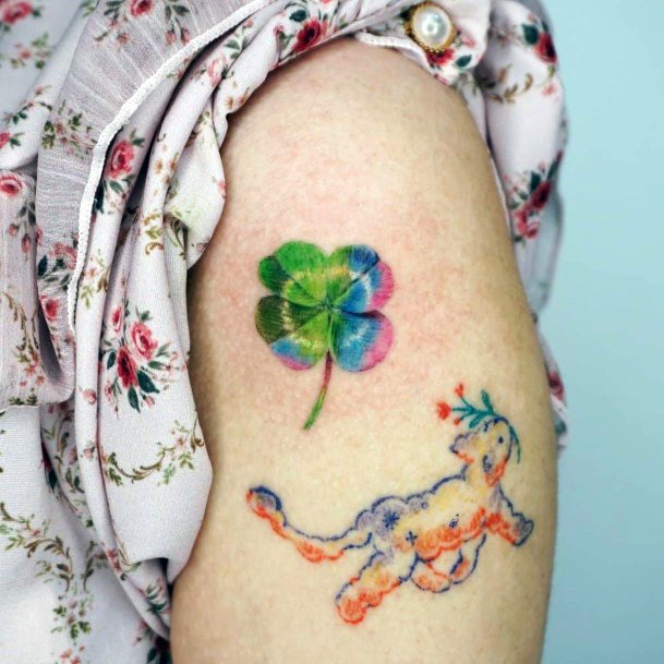 Female Clover Tattoo On Woman