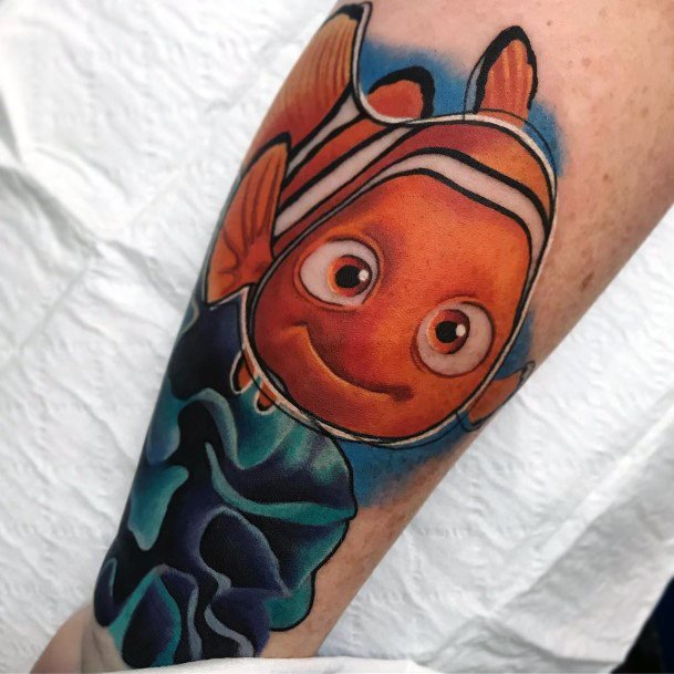 Female Clown Fish Tattoo On Woman