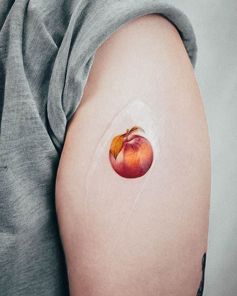 Female Cool Apple Tattoo Design