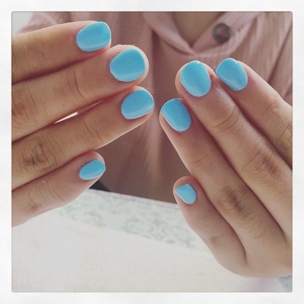 Female Cool Blue Short Nail Ideas