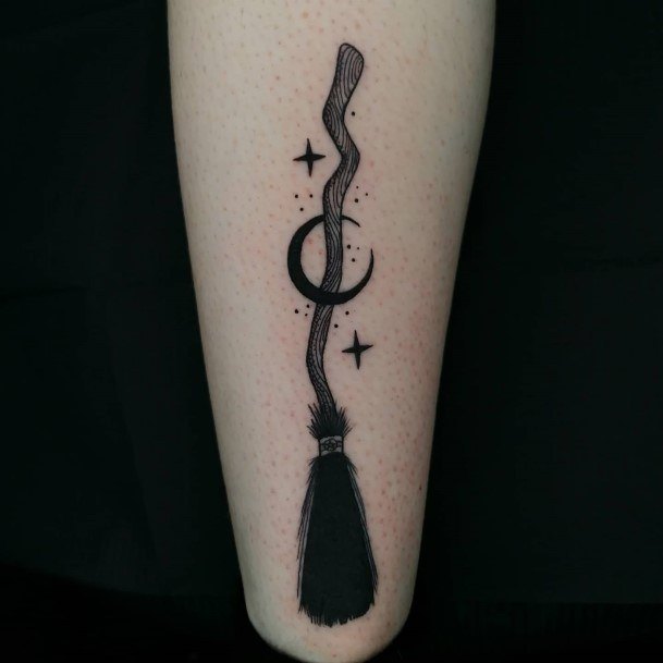 Female Cool Broom Tattoo Design