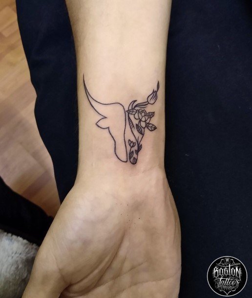 Female Cool Capricorn Tattoo Ideas Wrist Linework Outline